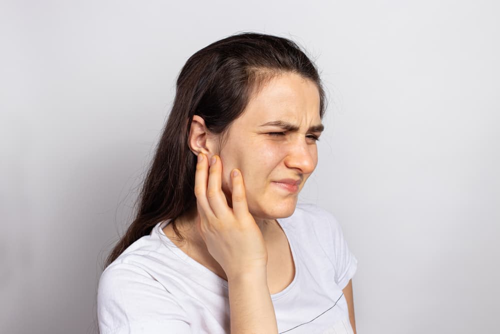 Women Suffering from Jaw Pain