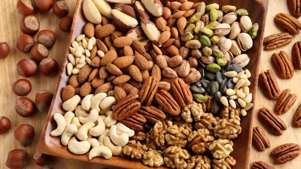 Nuts and seeds, such as almonds, walnuts, chia seeds, and flaxseeds, are rich in healthy fats and packed with nutrients like magnesium, zinc, and vitamin E.